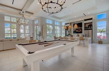 Club room with billiards and lounge seating